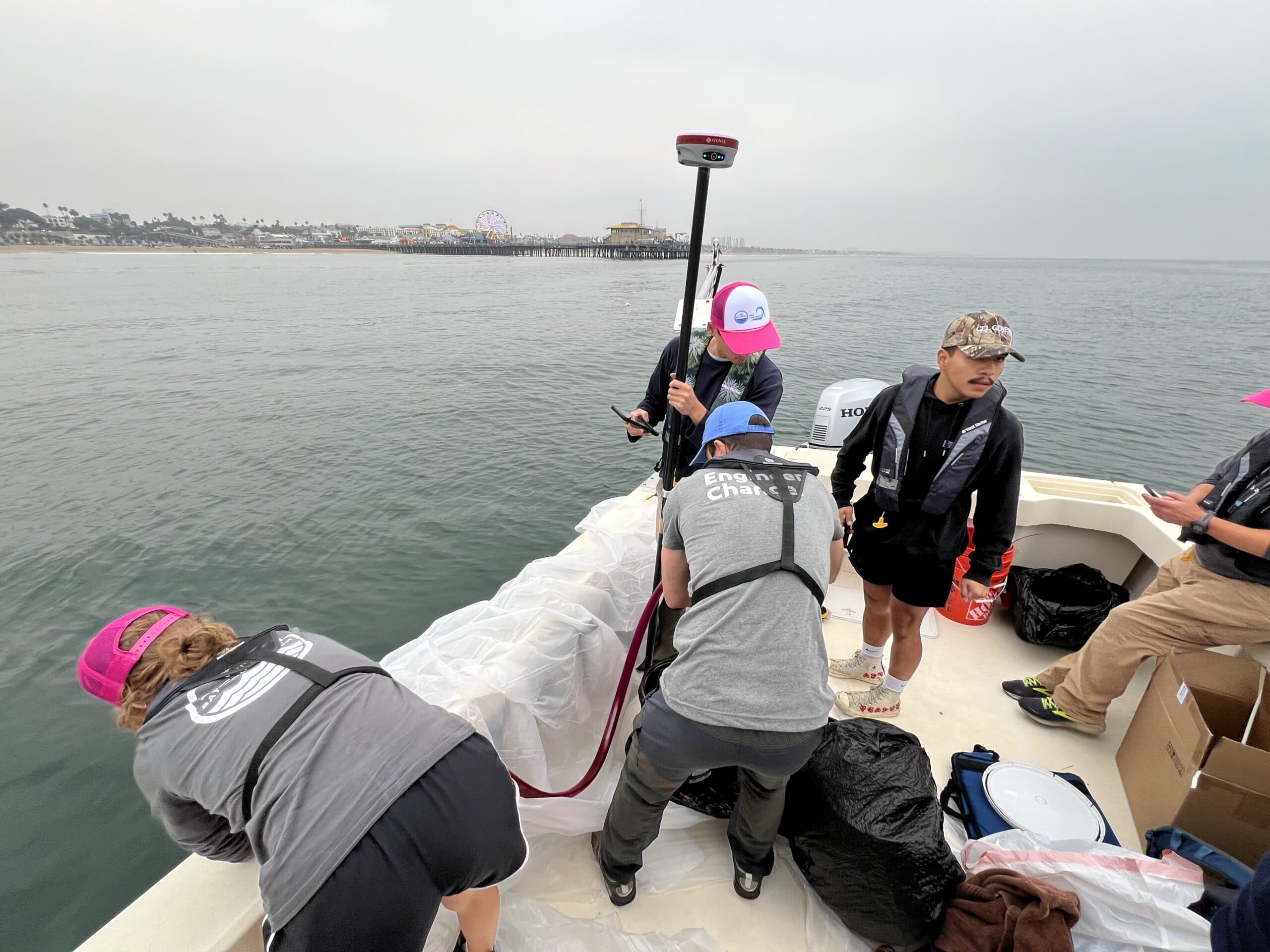UCLA + TBF scientists prepping for pink dye tracer experiment